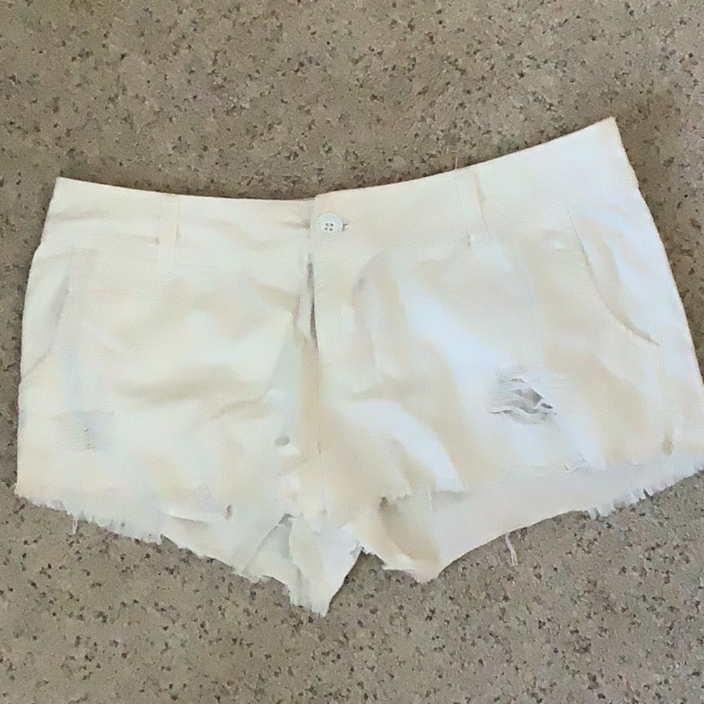 Mossimo Supply Co.  white distressed shorts. Size 9. Like new